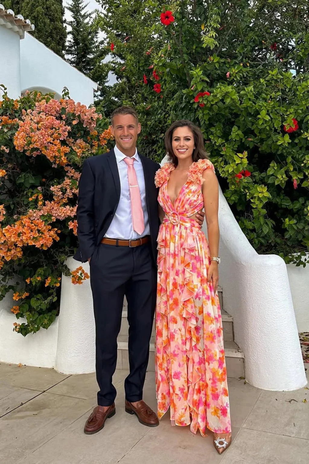 Women's Floral Chiffon Maxi Dress with Ruffle Sleeves and V-Neck - Maisie London