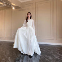 Women's White Chiffon Pleated Maxi Dress with Sheer Blouson Sleeves - Maisie London
