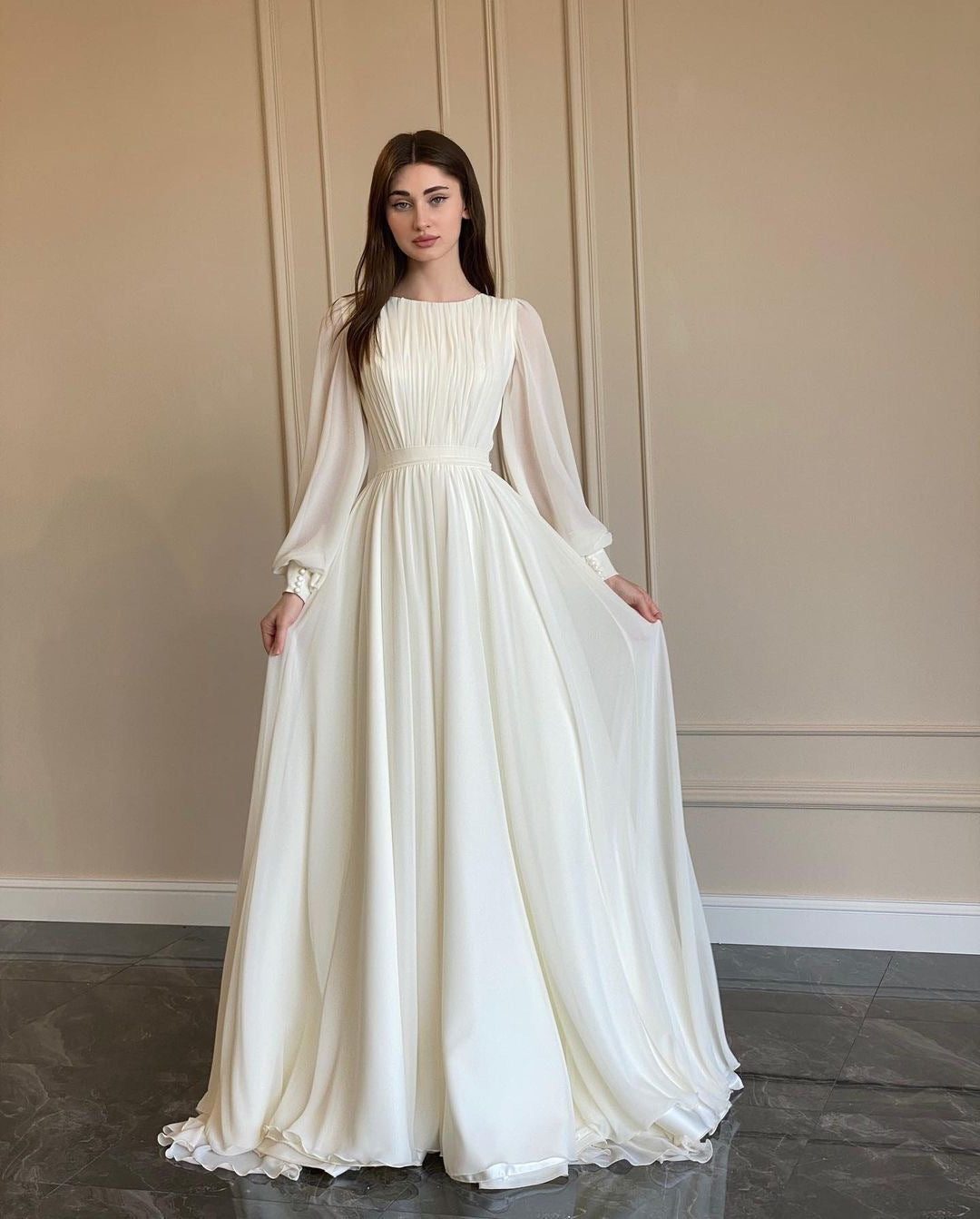 Women's White Chiffon Pleated Maxi Dress with Sheer Blouson Sleeves - Maisie London