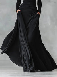 Women's Jersey Maxi Dress with Ruched Waist and Long Sleeves - Maisie London
