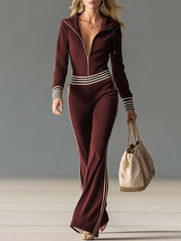 Women's Ribbed Hooded Jumpsuit with Zip Front and Flared Legs - Maisie London