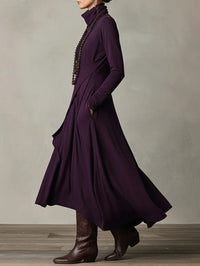 Women's Jersey Roll-Neck Maxi Dress with Asymmetric Hem and Pockets - Maisie London