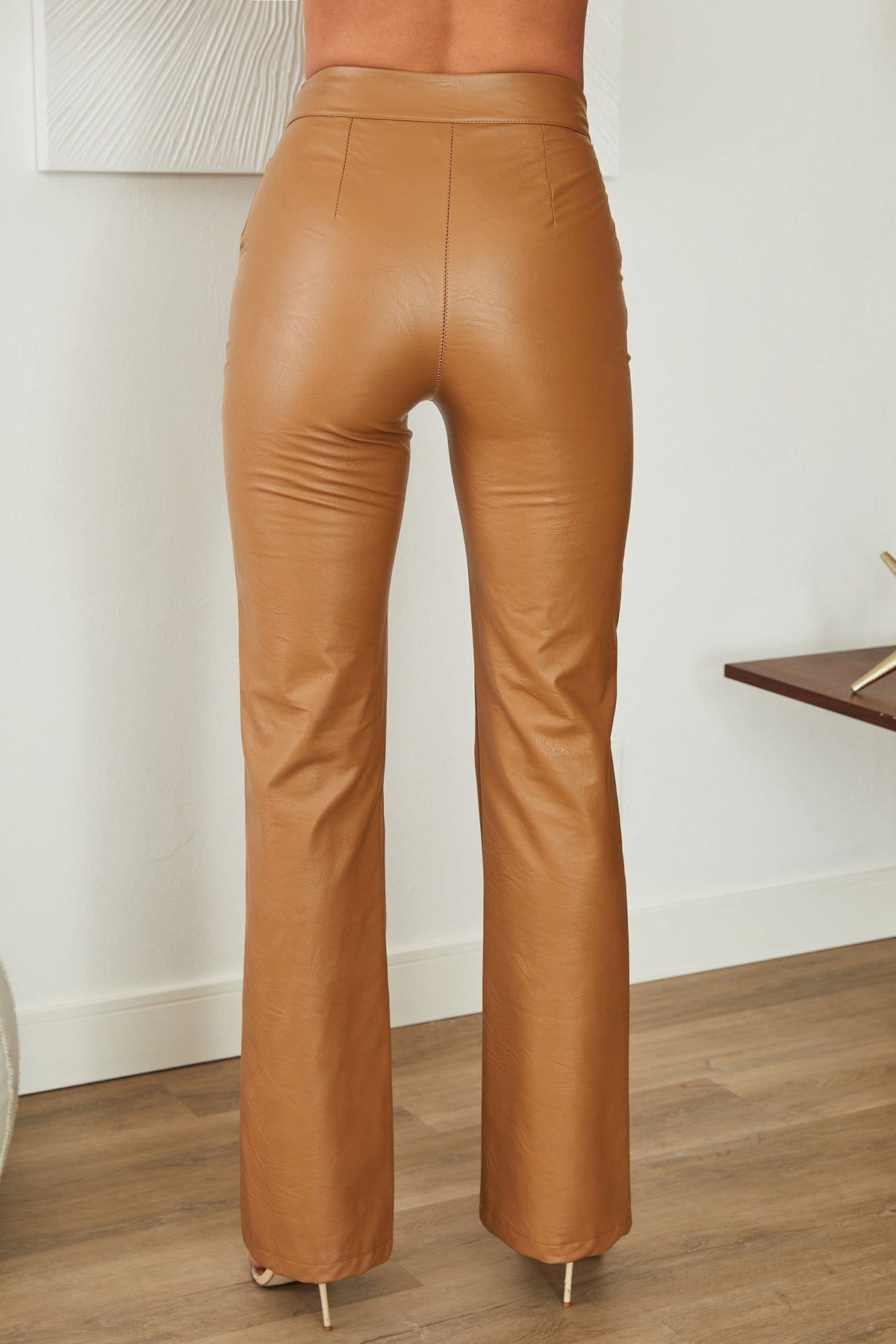 Women's Faux Leather High-Waisted Flared Trousers with Seam Detail - Maisie London
