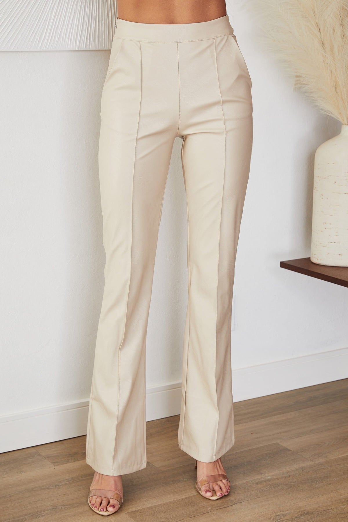 Women's Faux Leather High-Waisted Flared Trousers with Seam Detail - Maisie London