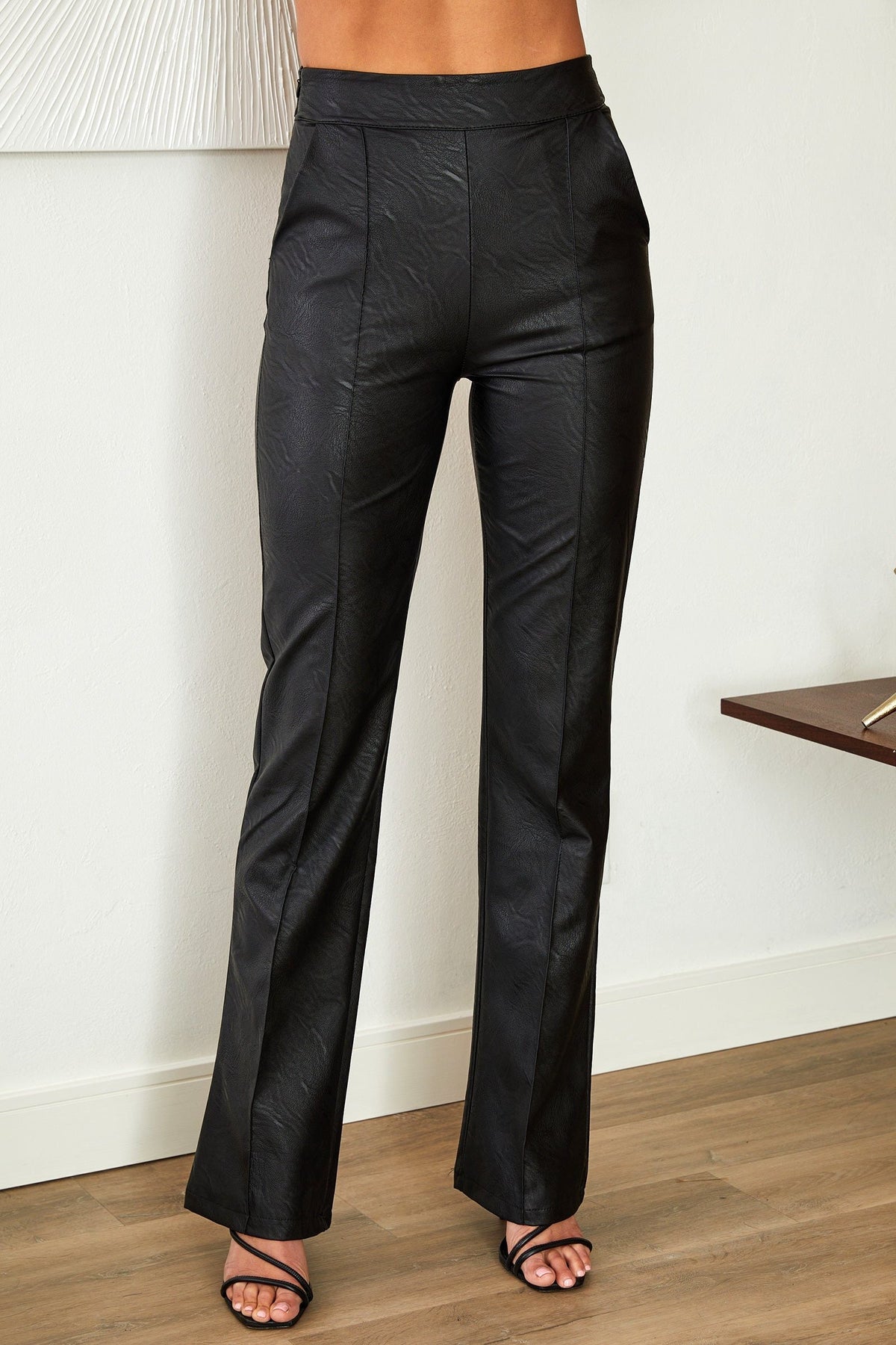 Women's Faux Leather High-Waisted Flared Trousers with Seam Detail - Maisie London