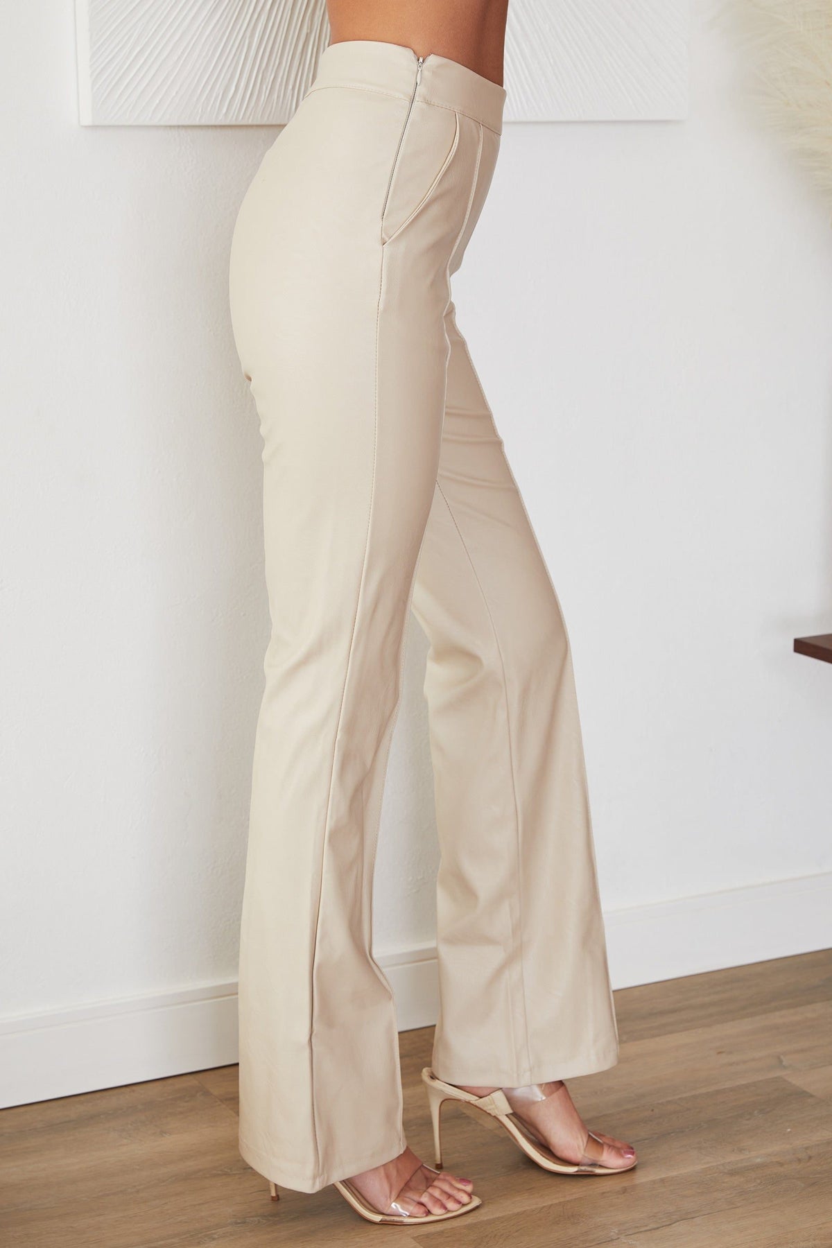 Women's Faux Leather High-Waisted Flared Trousers with Seam Detail - Maisie London