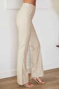 Women's Faux Leather High-Waisted Flared Trousers with Seam Detail - Maisie London