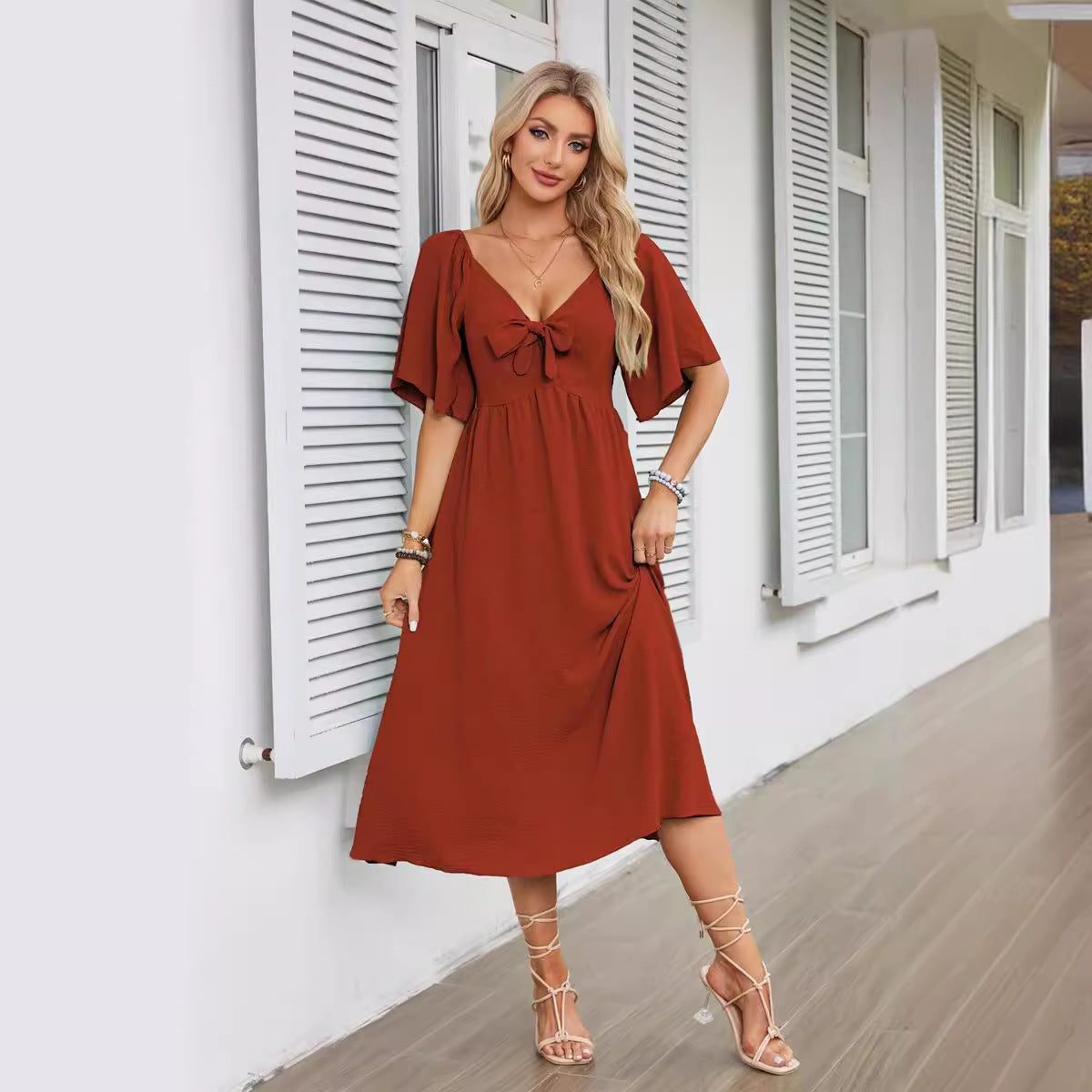Women's Textured Flutter Sleeve Midi Dress with V-Neck and Tie Front - Maisie London