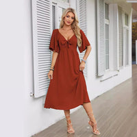 Women's Textured Flutter Sleeve Midi Dress with V-Neck and Tie Front - Maisie London