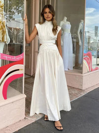 Women's Sleeveless Maxi Dress with High Collar and Waist Cut-Outs - Maisie London