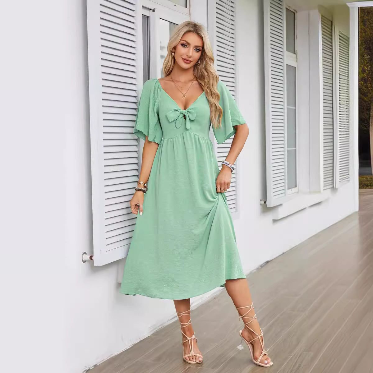 Women's Textured Flutter Sleeve Midi Dress with V-Neck and Tie Front - Maisie London
