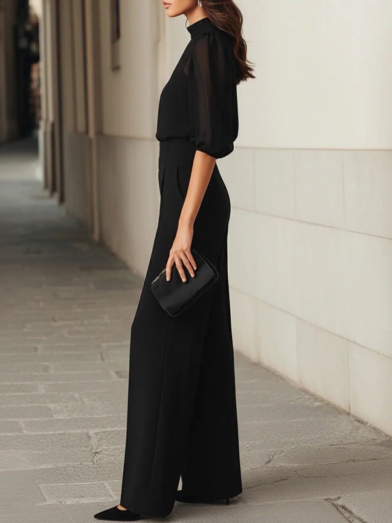 Women's Black Wide-Leg Jumpsuit with Puff Sleeves and Sheer Yoke - Maisie London